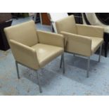 EASY CHAIRS, a pair, in beige leather on chromed metal supports, 54cm W.