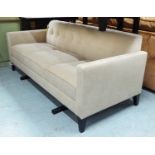 SOFA, with single raw button upholstery in clean fabric and dark tapered legs,