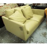 SOFA BY VALENTINI, two seater in cream leather on block supports, 178cm L.