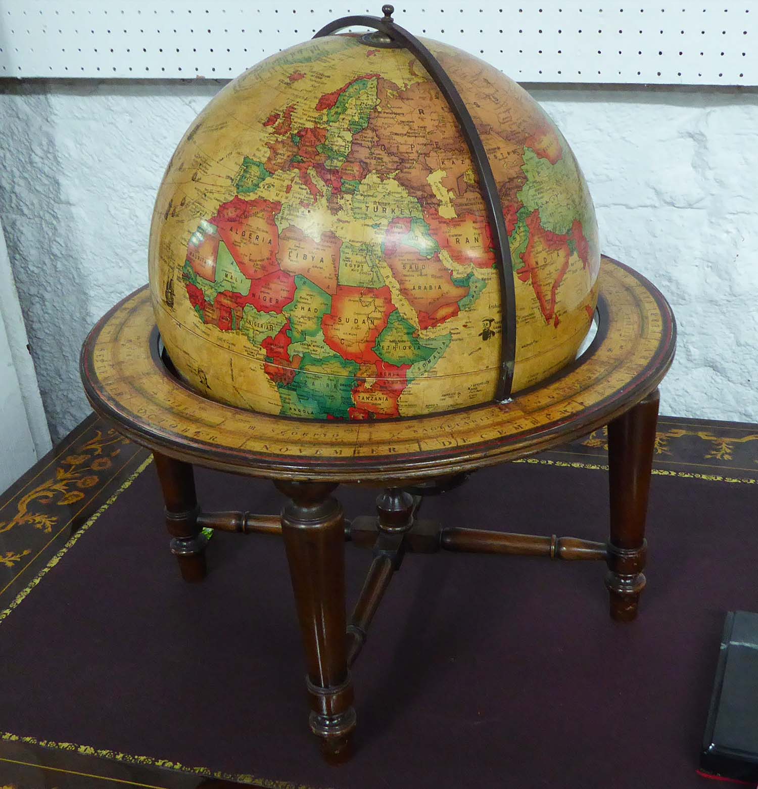 GLOBE, antique style, revolving on stand, approx. 50cm H.