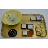 TRAY CONTAINING CARLTON CRUET / EGG CUP SET, 3 VARIOUS TRAVEL CLOCKS, ENAMEL CHAMBER STICK,