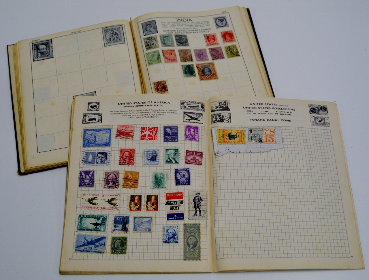 2 ALBUMS OF VARIOUS STAMPS