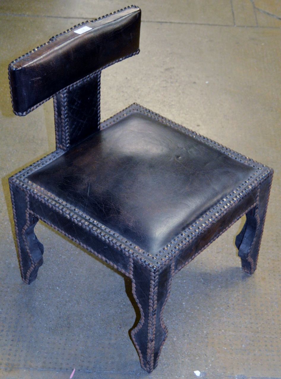 UNUSUAL STUDDED LEATHER CHAIR