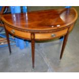 EDWARDIAN INLAID MAHOGANY HALF MOON FOLD OVER GAMES TABLE WITH BRASS CASTERS, HANDLES AND SHERATON