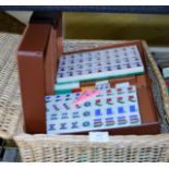 WICKER HAMPER WITH VARIOUS SETS OF PLAYING CARDS, MODERN MAH-JONG SET ETC