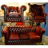 3 PIECE OX BLOOD CHESTERFIELD LEATHER LOUNGE SUITE COMPRISING 3 SEATER SETTEE, WING BACK CHAIR &