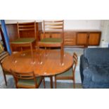 8 PIECE G-PLAN DINING ROOM SUITE COMPRISING - CIRCULAR EXTENDING TABLE, 6 HAND CHAIRS AND ENCLOSED