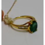 18 CARAT GOLD EMERALD SET RING WITH DIAMOND SHOULDERS