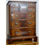 MAHOGANY 7 DRAWER CHEST WITH SINGLE DOOR ON BRACKET FEET