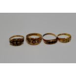 4 VARIOUS 9 CARAT GOLD DRESS RINGS - WEIGHT = APPROXIMATELY 6.9 GRAMS