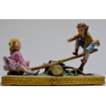 LARGE CAPODIMONTE CENTREPIECE - BOY & GIRL ON SEESAW