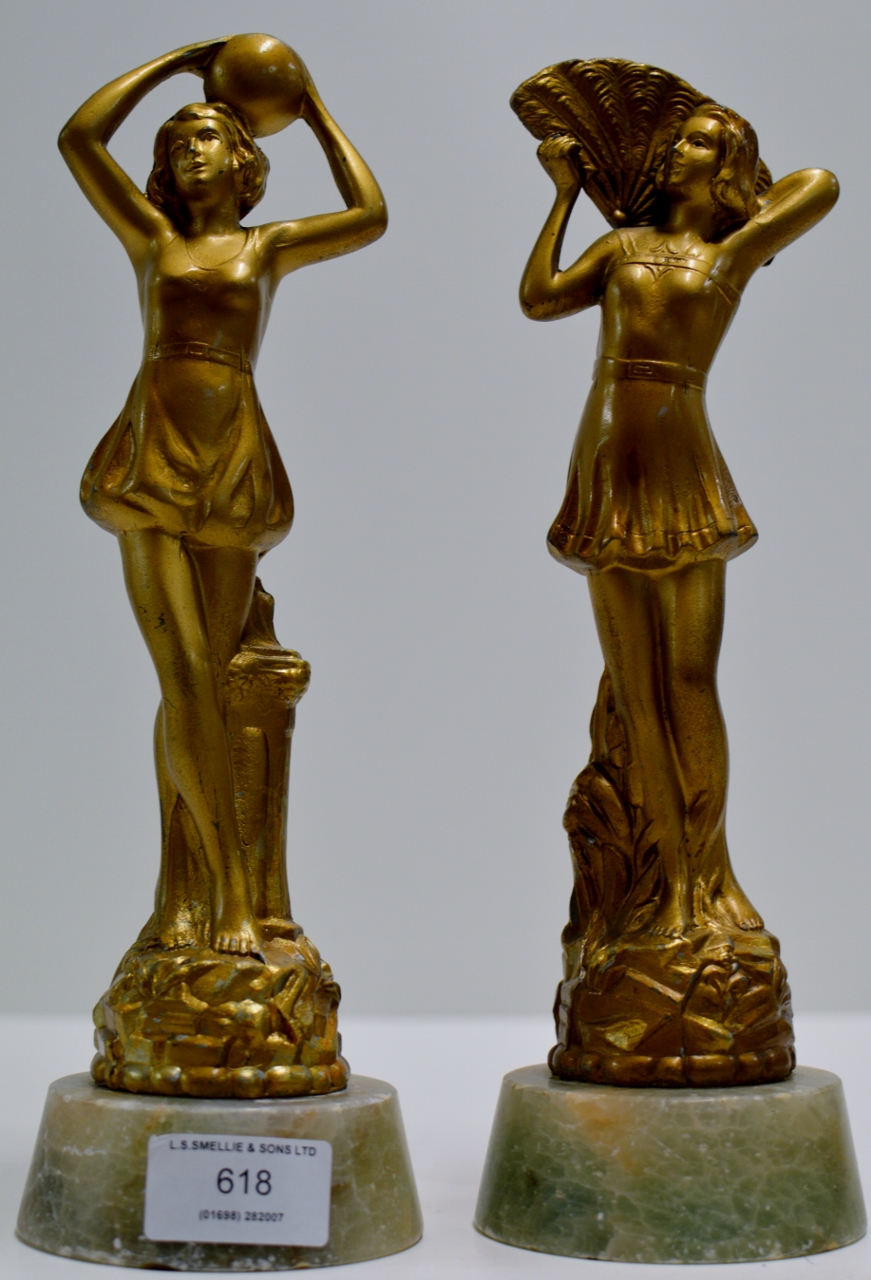 PAIR OF ART DECO COLD PAINTED FIGURINES ON ONYX STANDS