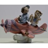 LLADRO DOUBLE FIGURINE ORNAMENT - BOY & GIRL ON A PLANE SURROUNDED BY BIRDS