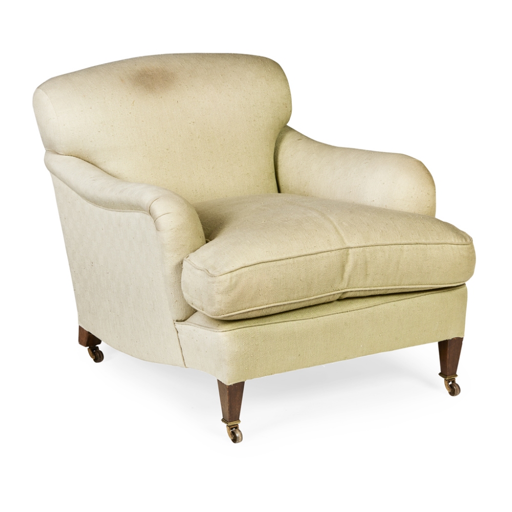 EDWARDIAN HOWARD & SONS 'IVOR' MODEL EASY ARMCHAIR EARLY 20TH CENTURY the low back and scroll arms