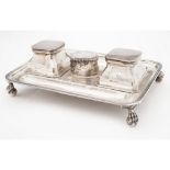 A desk inkstand John Grinsell & Sons, Birmingham 1913, the rectangular base with two deep pen trays,