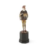 HANS KECK (1875-1941) PATINATED BRONZE & IVORY FIGURE, CIRCA 1925 cast as a page boy, carrying a