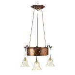 ARTS & CRAFTS COPPER CEILING LIGHT, CIRCA 1900 with three Vaseline frilled glass shades, suspended