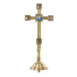 ENGLISH SCHOOL ARTS & CRAFTS BRASS AND ENAMEL SET CRUCIFIX, CIRCA 1900 the moulded cross set with