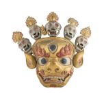 COPPER-ALLOY MASK OF BEGTSE TIBET, 19TH/20TH CENTURY the protector moulded with a ferocious