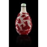 RED-OVERLAY SNOWFLAKE GLASS SNUFF BOTTLE QING DYNASTY, 18TH/19TH CENTURY the flattened ovoid body