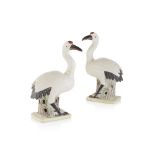 PAIR OF PORCELAIN CRANES QING DYNASTY, 19TH CENTURY realistically modelled in mirror image with