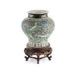 FAMILLE VERTE BISCUIT-GLAZED BALUSTER JAR QING DYNASTY, 18TH/19TH CENTURY the pierced sides