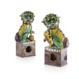 LARGE PAIR OF BUDDHIST LIONS QING DYNASTY, 19TH CENTURY the pair symmetrically modelled with a