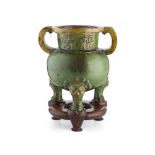 GREEN-GLAZED POTTERY CENSER MING DYNASTY, 17TH CENTURY the bulbous sides with twin scroll handles,