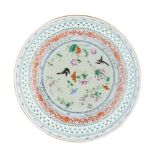 FAMILLE ROSE RETICULATED DISH QING DYNASTY, 19TH CENTURY brightly enamelled to the interior with a