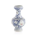 RARE FAMILLE ROSE 'PEONY' GARLIC-MOUTH VASE QING DYNASTY, 18TH/19TH CENTURY rising from an
