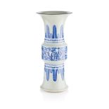 CELADON GLAZED BLUE AND WHITE DECORATED BEAKER VASE, GU QING DYNASTY, 19TH CENTURY the mid-section