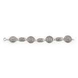 A CELTIC REVIVAL BRACELET ROBERT ALLISON, GLASGOW 1953 modelled in silver with Celtic boss and