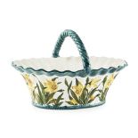 A LARGE WEMYSS WARE BASKET 'DAFFODILS' PATTERN, CIRCA 1900 impressed maker's marks WEMYSS, printed