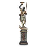 VENETIAN CARVED, POLYCHROMED AND GILT BLACKAMOOR TORCHERE 19TH CENTURY the figure standing in the