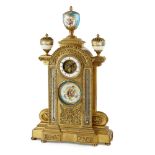 FRENCH GILT METAL AND PORCELAIN COMBINATION MANTEL CLOCK 19TH CENTURY the open dial with a Roman