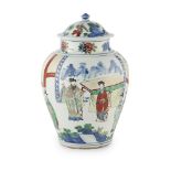 CHINESE WUCAI PORCELAIN JAR AND COVER 19TH CENTURY of squat baluster shape with a domed cover with