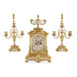 FRENCH PINK PORCELAIN AND GILT BRONZE CLOCK GARNITURE BY LEROY & FILS 19TH CENTURY surmounted by