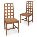 PETER WAALS (1870-1937) AFTER DESIGNS BY ERNEST GIMSON PAIR OF OAK LATTICE-BACKED CHAIRS, CIRCA 1910