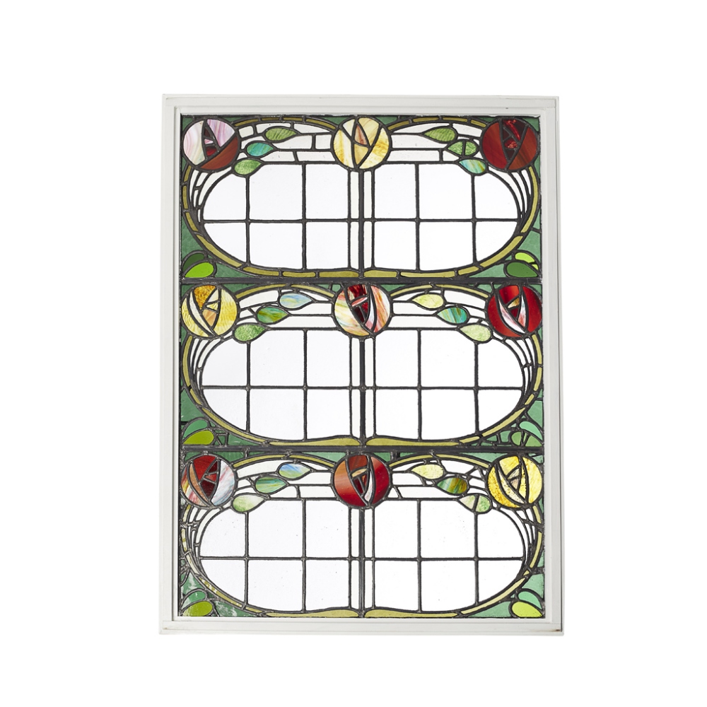 GLASGOW STYLE FINE STAINED AND LEADED GLASS PANEL, CIRCA 1910 worked as entwined and flowering