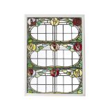 GLASGOW STYLE FINE STAINED AND LEADED GLASS PANEL, CIRCA 1910 worked as entwined and flowering