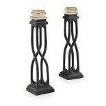 ARTS & CRAFTS PAIR OF TABLE CANDLESTICKS, EARLY 20TH CENTURY carved and ebonised wood with early