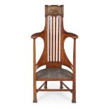 ARTS & CRAFTS OAK ARMCHAIR, CIRCA 1900 the slatted back with upholstered panel with close nailed