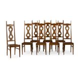 AFTER CHARLES FRANCES ANNESLEY VOYSEY SET OF EIGHT ARTS & CRAFTS OAK CHAIRS, CIRCA 1910 each with