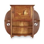 SHAPLAND & PETTER, BARNSTAPLE OAK WALL CUPBOARD, CIRCA 1900 with marquetry inlaid door depicting a