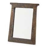 ARTS AND CRAFTS COPPER FRAMED DRESSING MIRROR, CIRCA 1900 of splayed rectangular form, with stylised