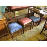 A pair of Edwardian walnut side chairs, the patera carved backs above overstuff seats and turned
