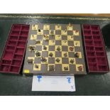 A die-cast chess set, the pieces forming figures from the 'Glorious Revolution', 4cm high