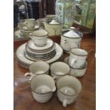 A Denby Savoy pattern breakfast service for four place settings including a teapot