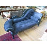 A French style matt black chaise longue, with black suede upholstery