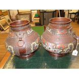 A pair of bronze and cloisonne enamel incense burners with lattice bands, loop handles and